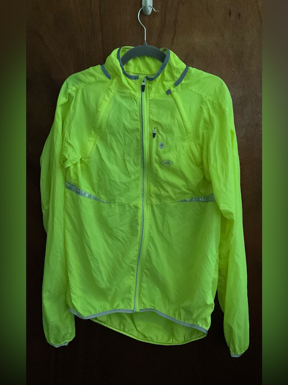 Performance Bicycle convertible neon yellow cycling jacket.